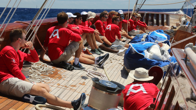 Adela's crew sitting on the deck